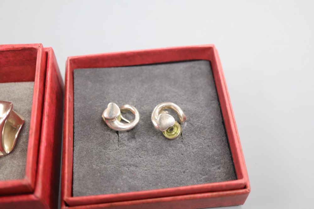 Regitze Overgaard for Georg Jensen, a pair of sterling silver heart earrings and a pair of modernist ear clips by Nanna Ditzel,